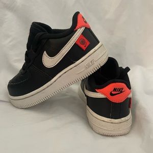 7C coral and black Nikes